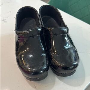 Dansko Black Professional Mules with Glossy Finish